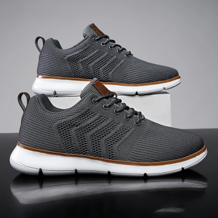 Stylish men's active wear sneakers. Breathable mesh sport shoes with superior traction for all-day comfort.