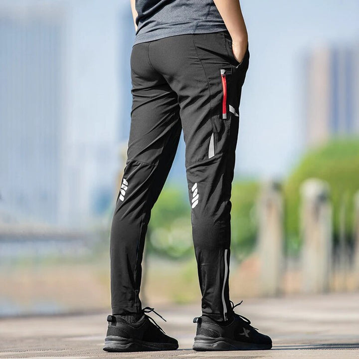 Men's reflective cycling pants offering breathable stretch for performance and comfort in sports apparel.