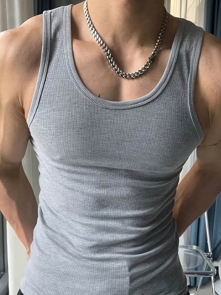 Athletic man wearing a lightweight, breathable tank top during an intense summer workout. Comfortable fit.