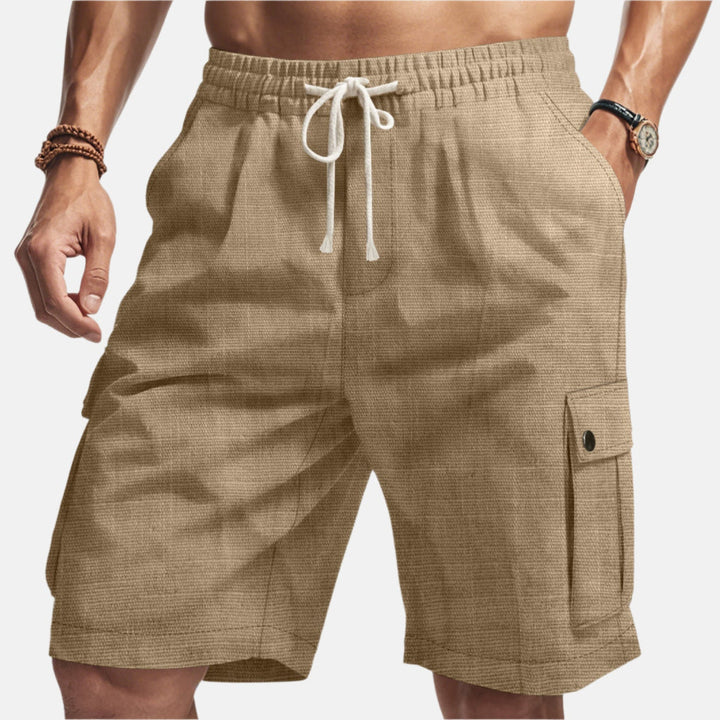 Lightweight men's summer cargo shorts, breathable fabric, ideal for beach, outdoor activities & vacation wear. Loose fit.