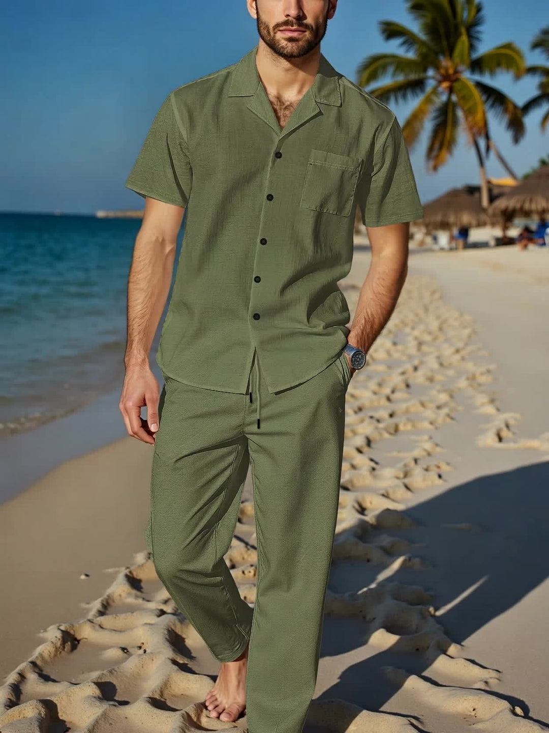 Man posing confidently in a BreezeWear men's linen set. Ideal for a sophisticated, relaxed summer style.