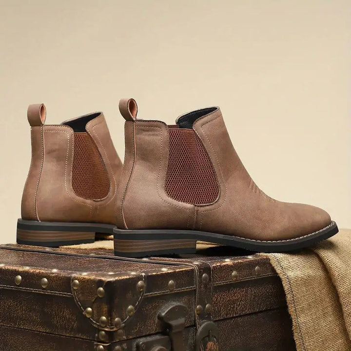Men's versatile slip-on Chelsea boots in black, featuring a stylish western stitch. Perfect for smart casual looks.