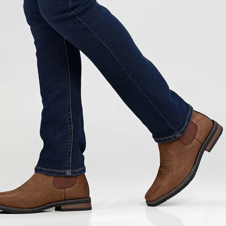 Stylish men's tan suede Chelsea boots, perfect smart casual slip-on ankle wear with western stitch.