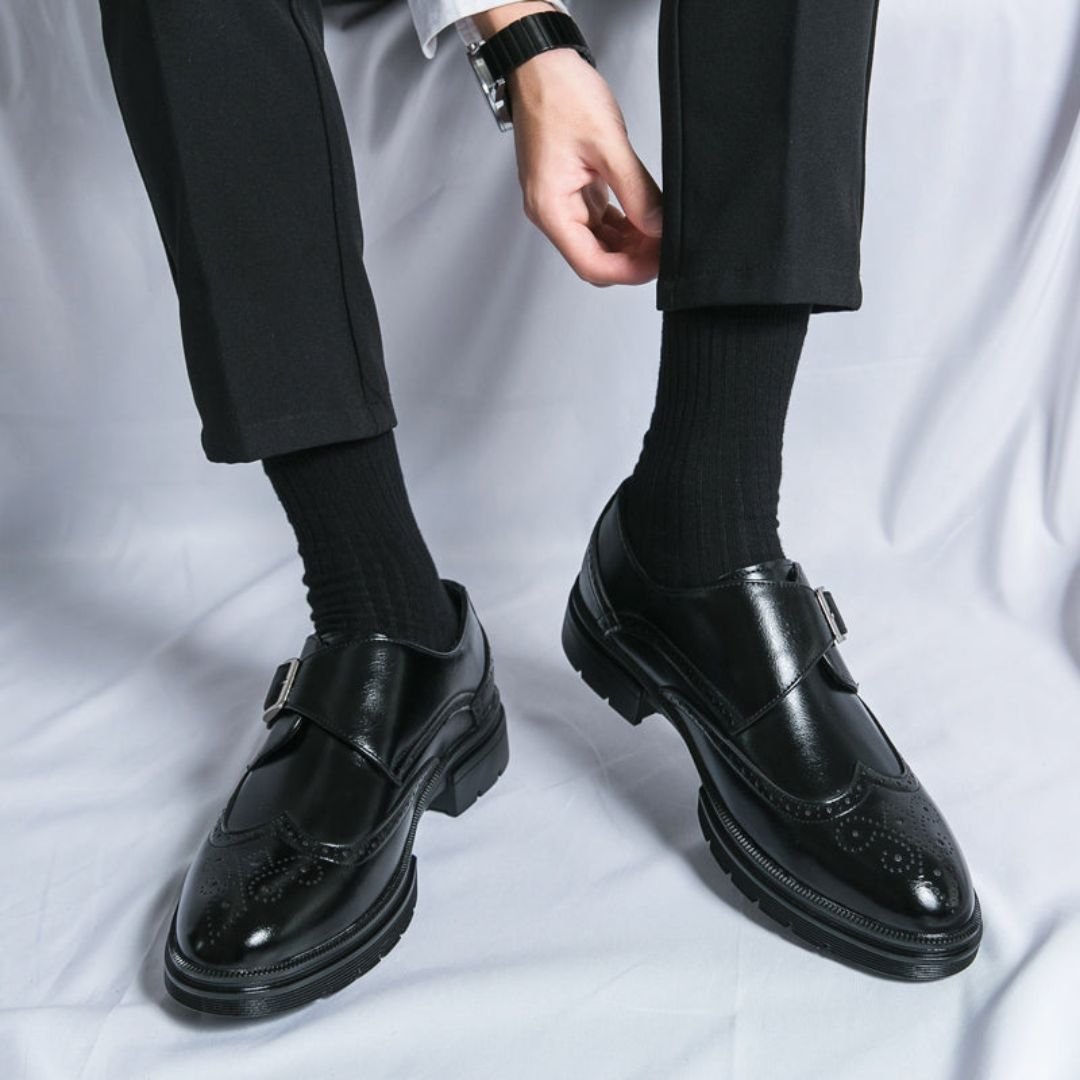 Elegant men's black monk strap brogue dress shoes with wingtip detailing, perfect for office wear & special occasions.