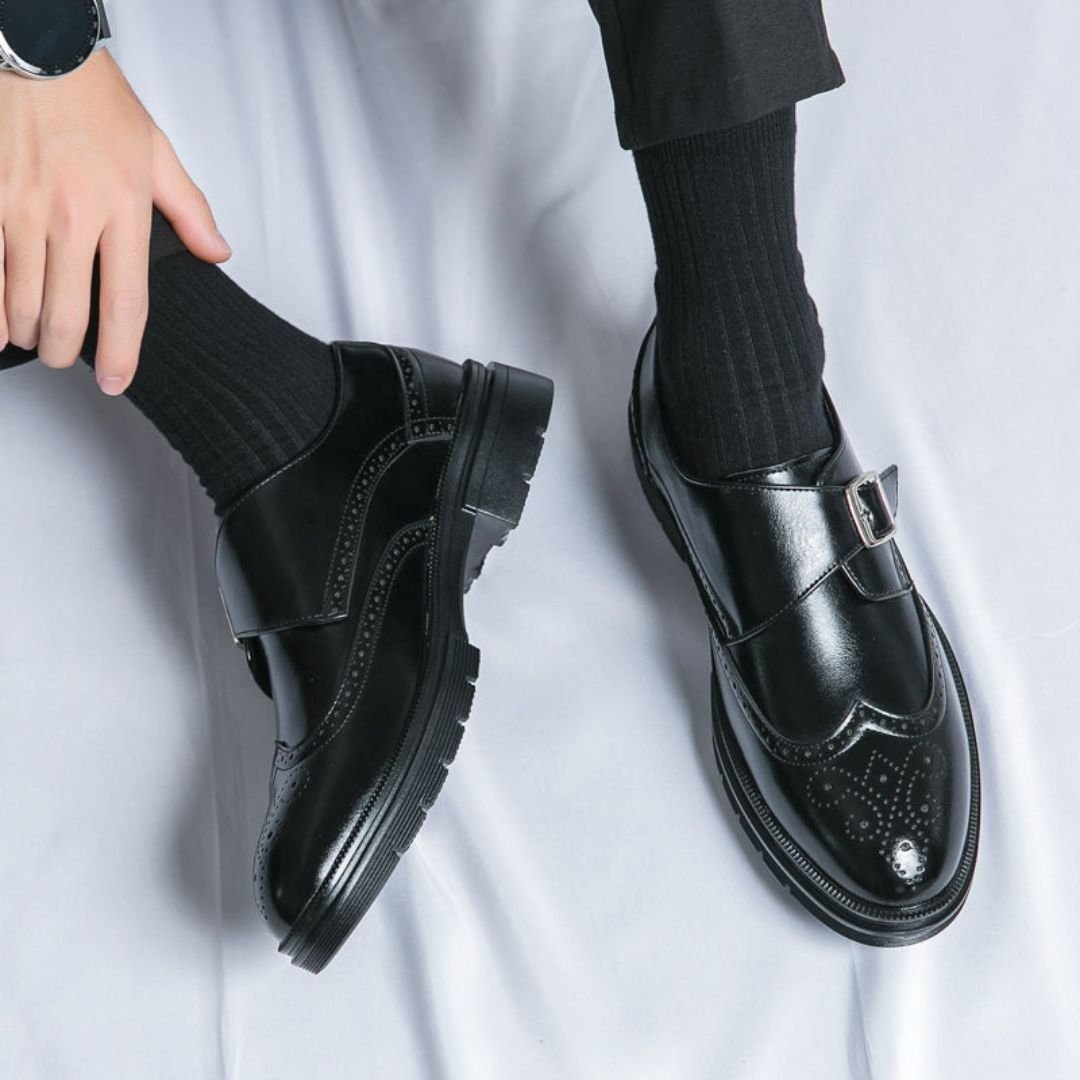 Classic men's slip-on monk strap wingtip brogue dress shoes in dark brown, ideal for smart casual & professional looks.