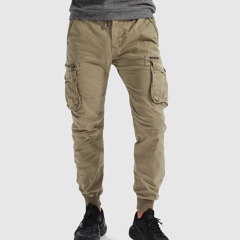 Men's cargo joggers with multiple pockets & elastic waist. Perfect for streetwear & casual wear.