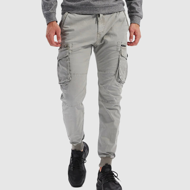 Men's utility cargo joggers showcasing multi-pockets. Functional & stylish for everyday wear.