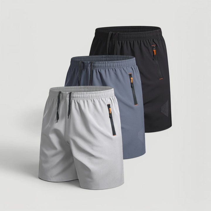 Men's gym shorts 3-pack, quick-dry athletic wear with secure zip pockets for workouts.