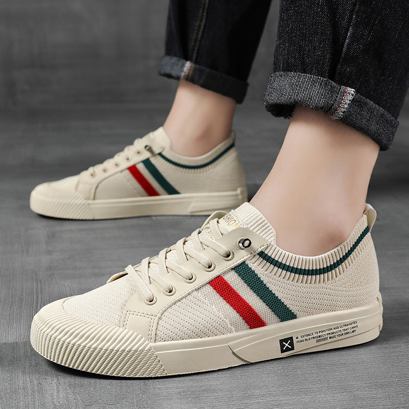 Comfortable men's lace-up sneakers featuring stylish striped detail, ideal casual footwear for men's fashion.