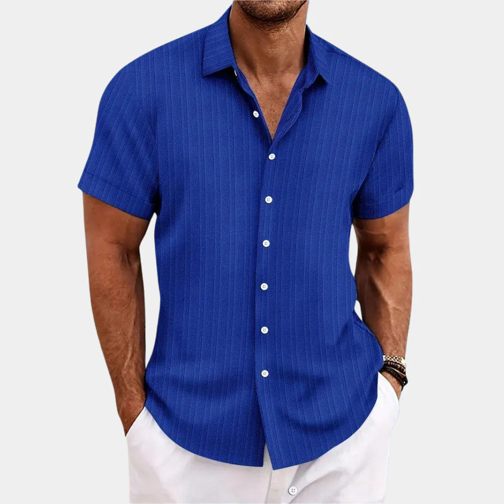 Men's casual button-down shirt for warm weather, relaxed fit. Breathable summer style.