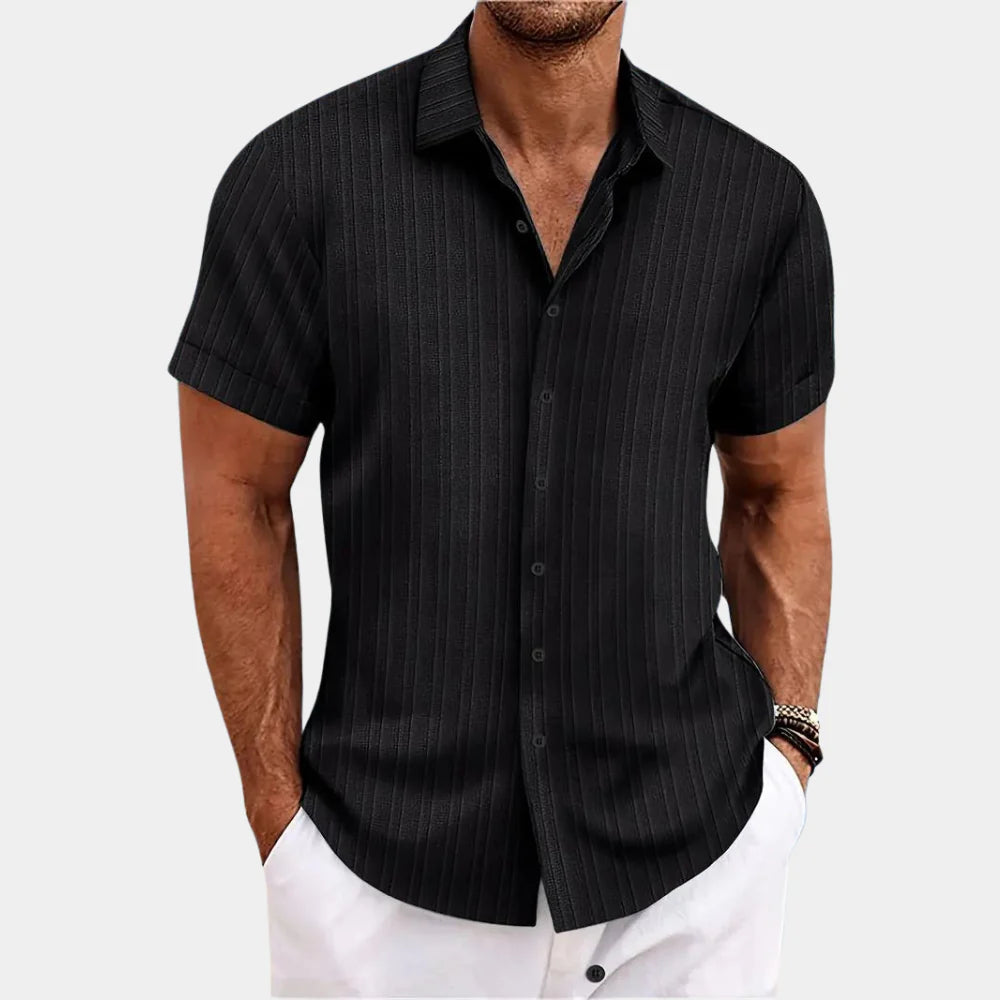 Versatile men's casual button-down shirt, easy care, relaxed fit for everyday summer wear.