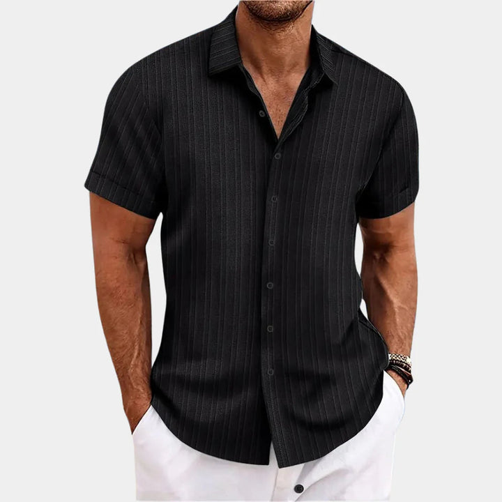 Versatile men's casual button-down shirt, easy care, relaxed fit for everyday summer wear.