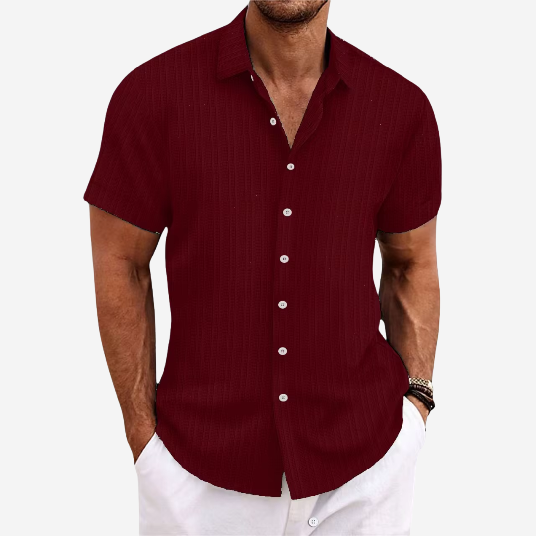 Modern men's casual button-down shirt, relaxed fit, ideal for versatile summer and warm weather style.