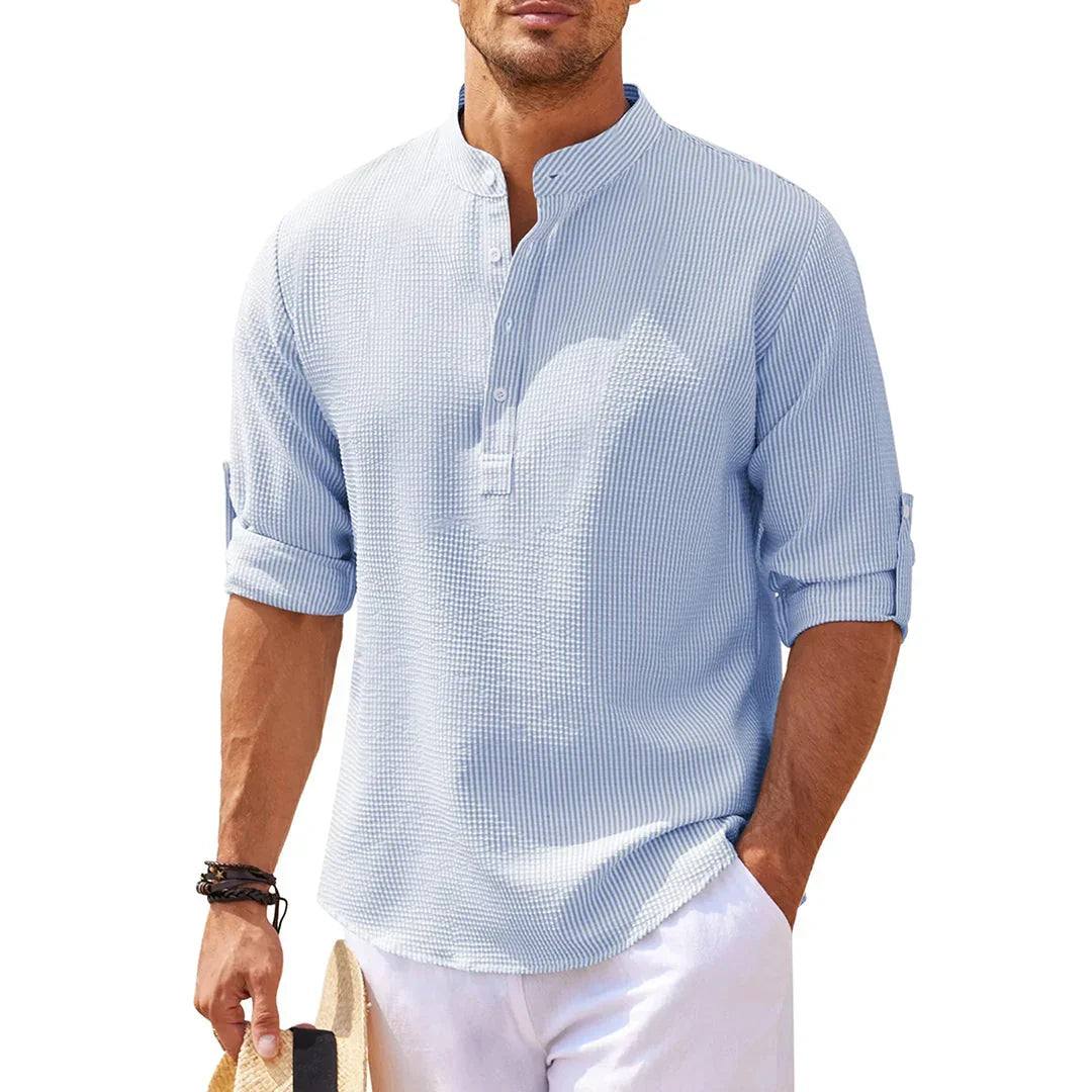 New men's button-down shirt, long sleeve, offering smart style for casual outings or business casual events.