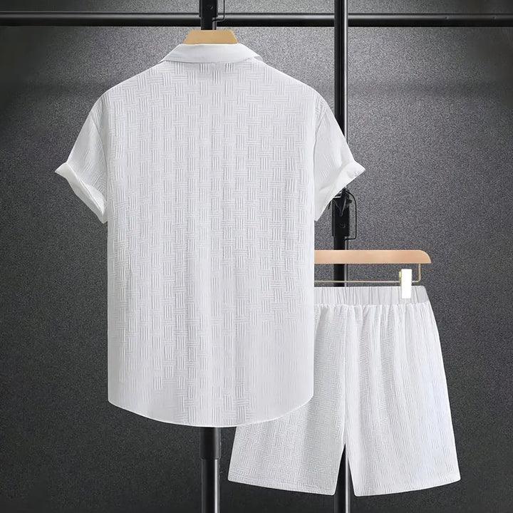 Trendy men's summer shorts set featuring a short sleeve button-down shirt for a stylish & relaxed look.