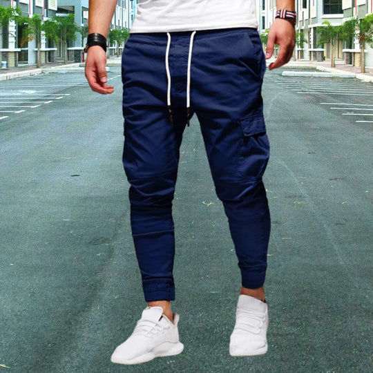 Durable men's utility pants, cargo style with secure flap pockets. Comfortable straight leg, perfect for casual fashion.