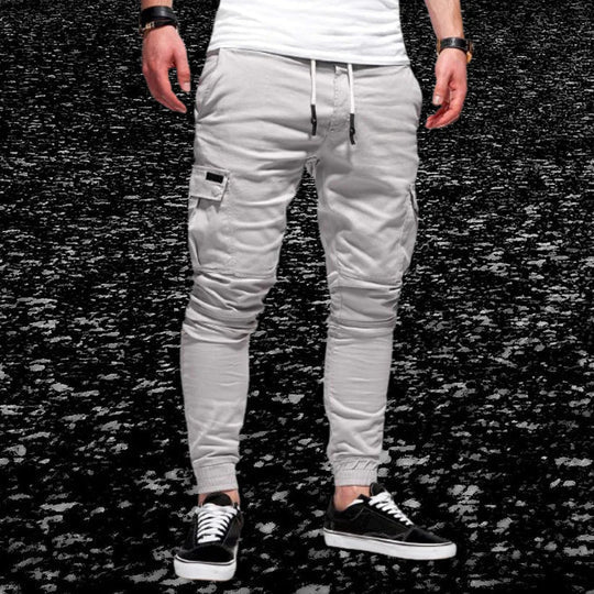 Essential men's cargo pants. Casual design, comfortable straight leg, relaxed fit with practical flap pockets for daily wear.
