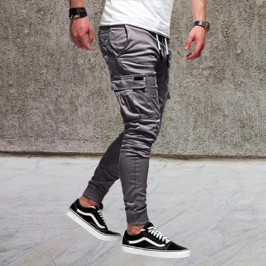 Comfortable men's casual cargo pants with convenient flap pockets. Versatile straight leg style for modern everyday fashion.