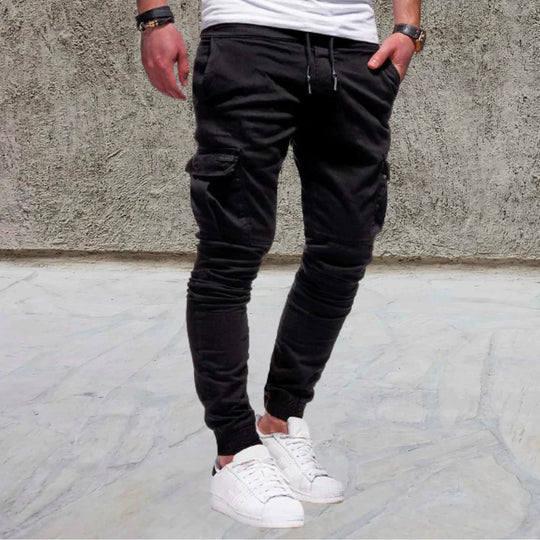 Men's relaxed fit cargo pants. Practical flap pockets & a straight leg design make these casual utility pants perfect for men.