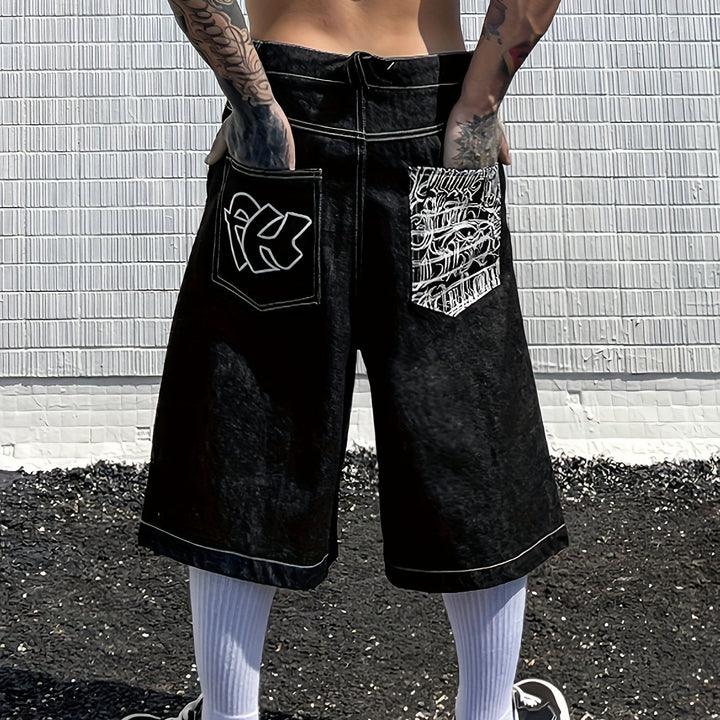 Floral embroidered denim Bermuda shorts for men, ideal for stylish summer fashion. Loose fit.