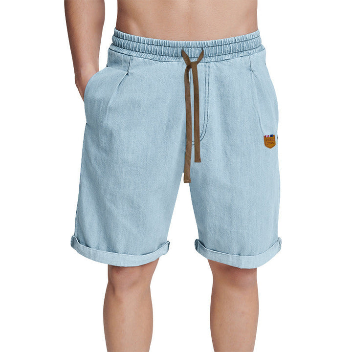 Stylish men's casual denim shorts featuring a relaxed fit and practical drawstring waist for comfort.