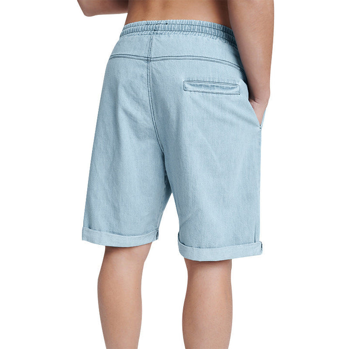 Warm weather essential: Men's relaxed fit denim shorts with an elastic drawstring waist for ultimate comfort.