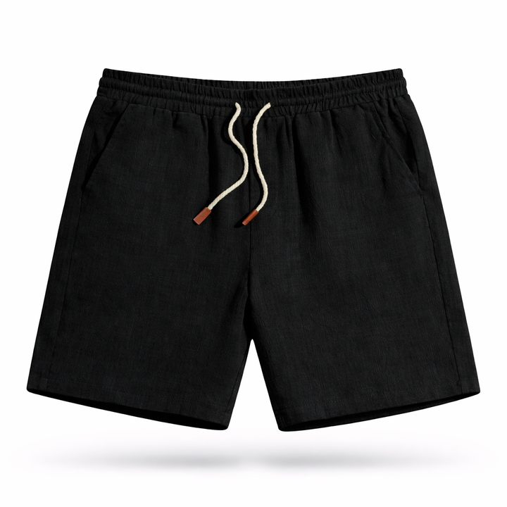 Man wearing relaxed-fit drawstring casual shorts for summer, suitable for everyday activities.
