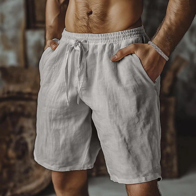 Close-up of men's casual shorts highlighting the comfortable drawstring waist and practical pockets.