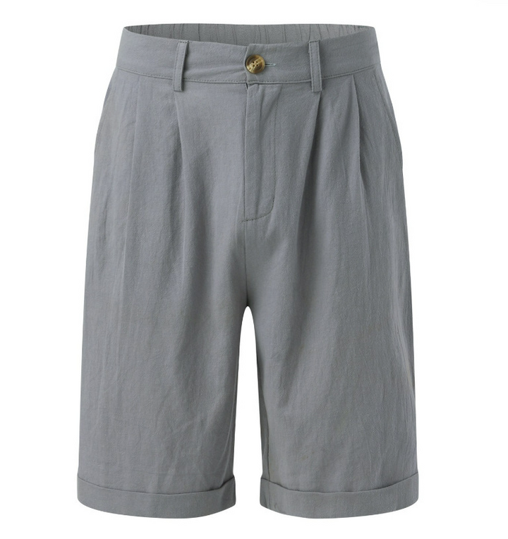 Detailed view of men's casual elegant shorts fabric, highlighting quality & versatile spring/summer style.