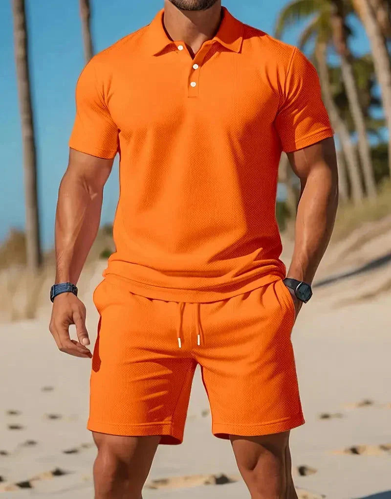 Stylish men's knit polo and shorts set for casual wear, leisure, or travel. Effortless summer coordinated outfit.
