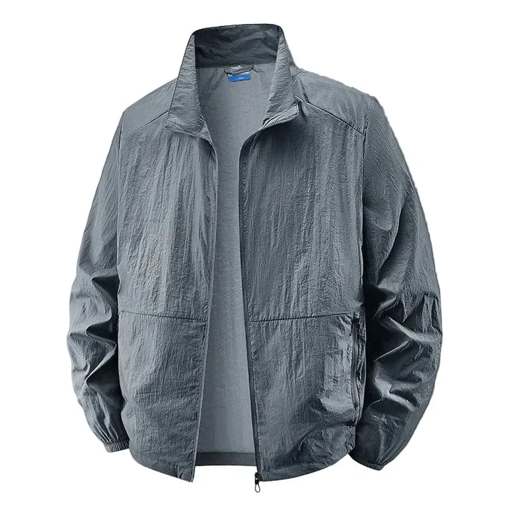 A man wearing a sleek, lightweight casual collared jacket, perfect for a modern everyday look and comfort.