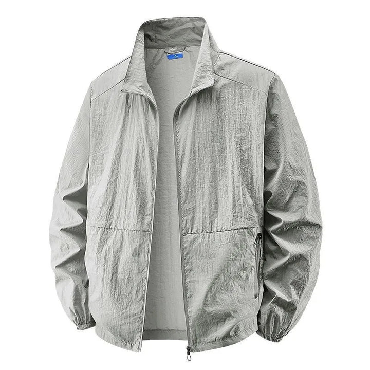 Close-up of a men's collared lightweight jacket, featuring a full zip closure and comfortable, modern design.