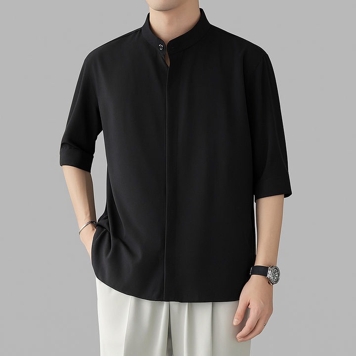 Modern men's mandarin collar long-sleeve shirt. Versatile for casual or semi-formal wear, comfortable relaxed fit.