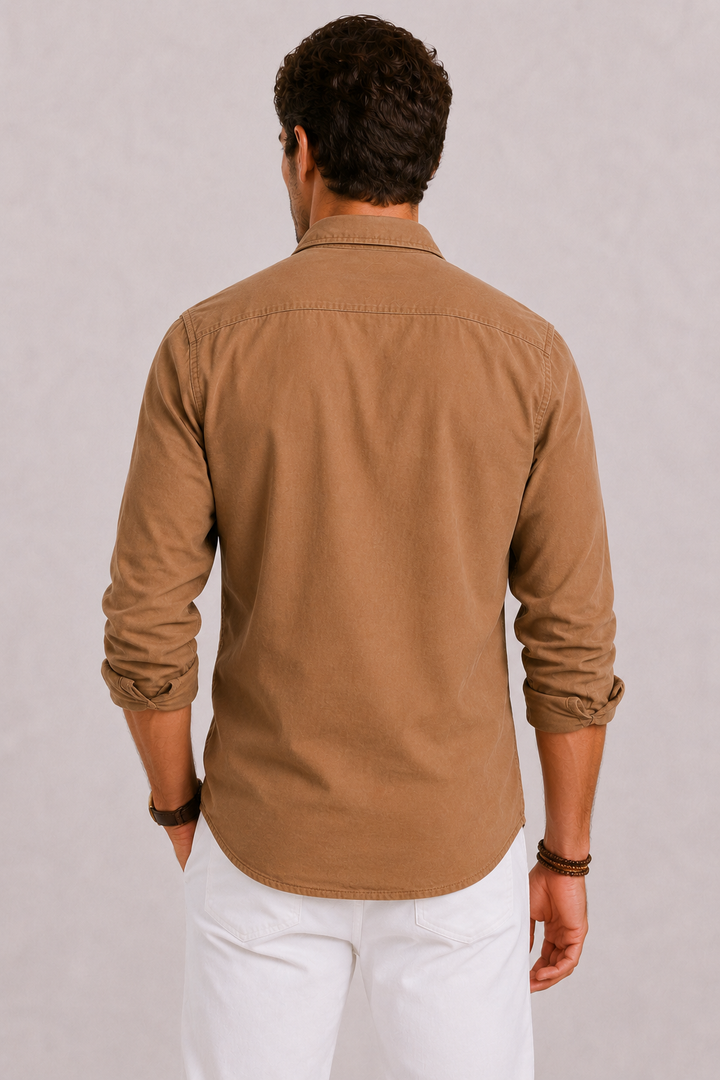 Comfortable men's Oxford button-up shirt, long-sleeve, ideal for everyday style & travel, offering all-day wear.