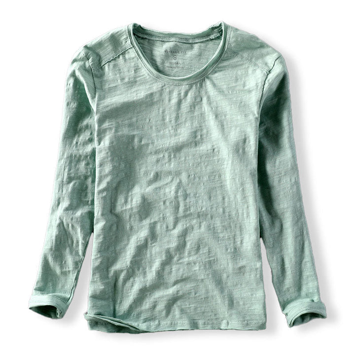 Stylish men's textured long sleeve crew neck shirt, ideal for versatile autumn & spring casual wear.