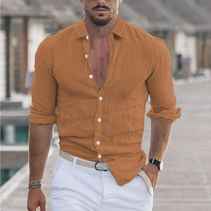 Versatile men's casual turn-down collar shirt. Long sleeve, relaxed fit button-up for stylish everyday comfort.