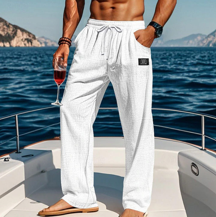 Lightweight & breathable men's summer trousers, ideal for hot weather. Features comfortable loose fit & lace waist.