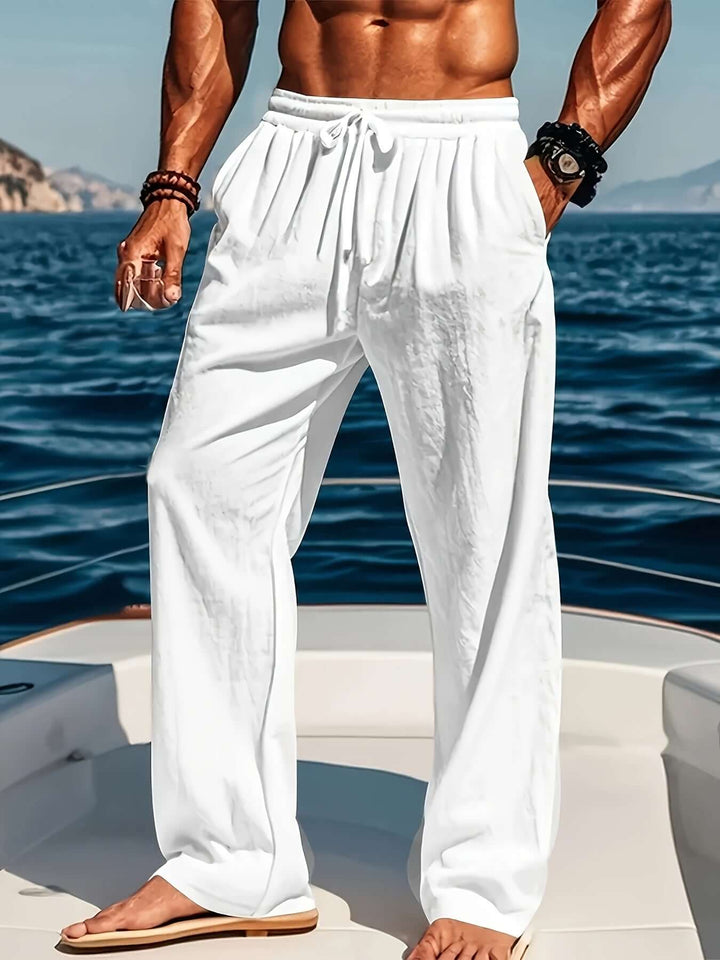 Men's casual loose fit trousers with drawstring waist for relaxed comfort.