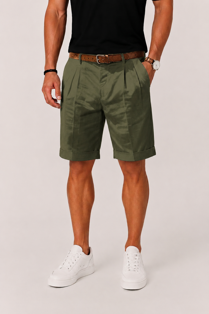Effortless style with men's pleated shorts. Comfortable straight leg design for warm weather fashion.
