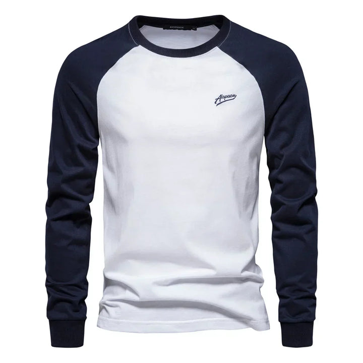 Stylish men's raglan long sleeve crew neck shirt, ideal for athletic style and everyday casual fashion.