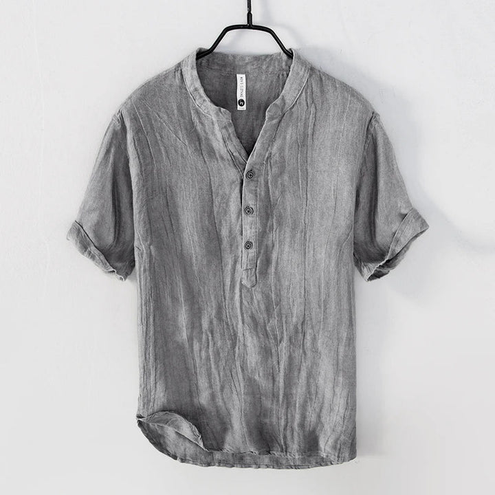 Men's casual short sleeve Henley shirt in a relaxed fit, perfect for breathable summer fashion and warm weather style.