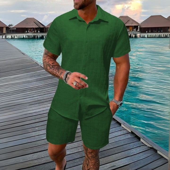 Fashionable men's loungewear set; short sleeve top and shorts ideal for casual summer days.