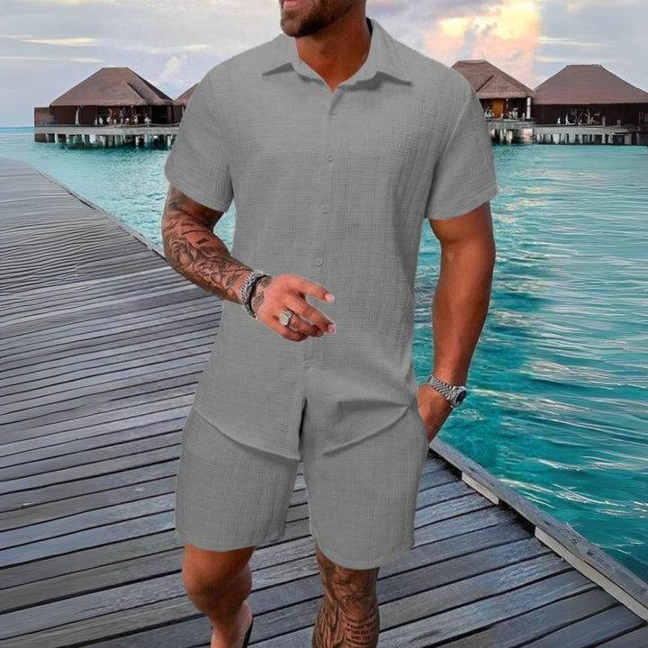 Versatile men's casual two-piece summer set; includes a short sleeve shirt & matching shorts.