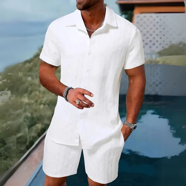 Modern men's casual short sleeve shirt and shorts ensemble, perfect for relaxed summer wear.