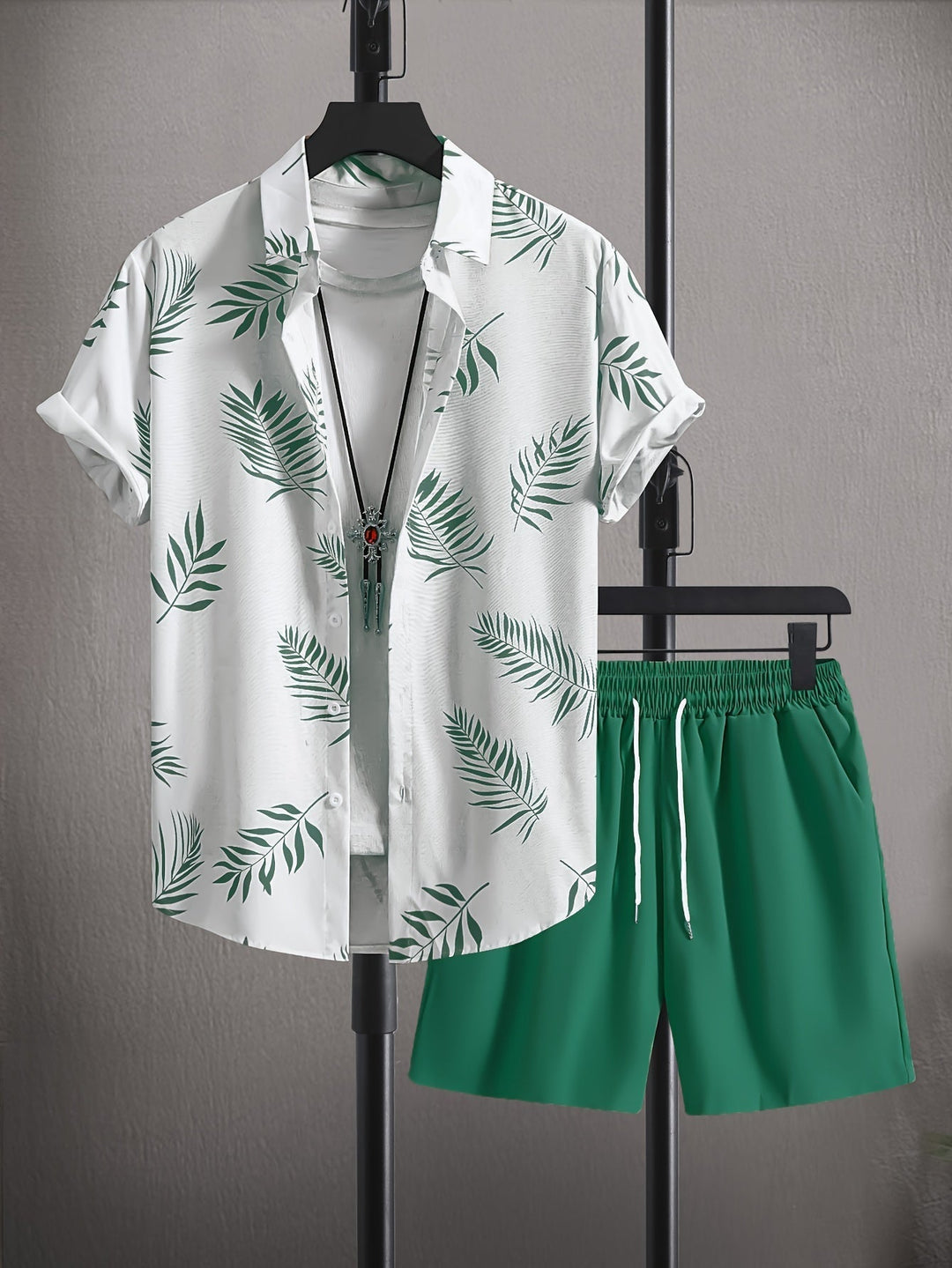 Comfortable men's casual short-sleeve two-piece set with abstract design. Ideal summer vacation shorts & top.