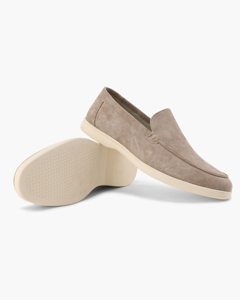 Classic men's slip-on loafers with durable sole, offering comfort and smart casual appeal.