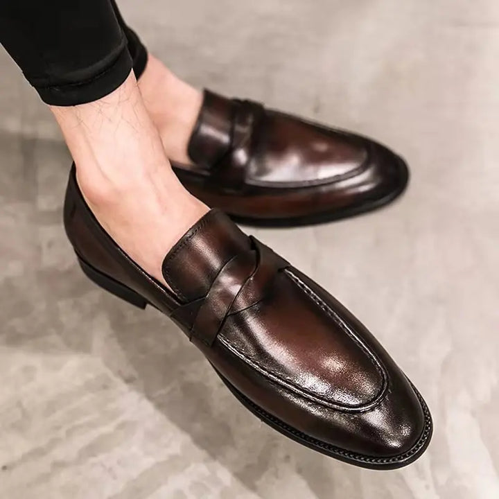 Durable men's slip-on loafers, offering everyday comfort and a smart casual aesthetic for versatile wear.