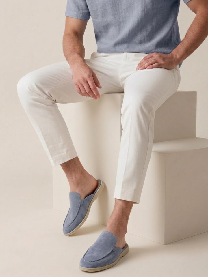 Top-down view of men's slip-on mules, highlighting the comfortable design & stylish stitched detail.