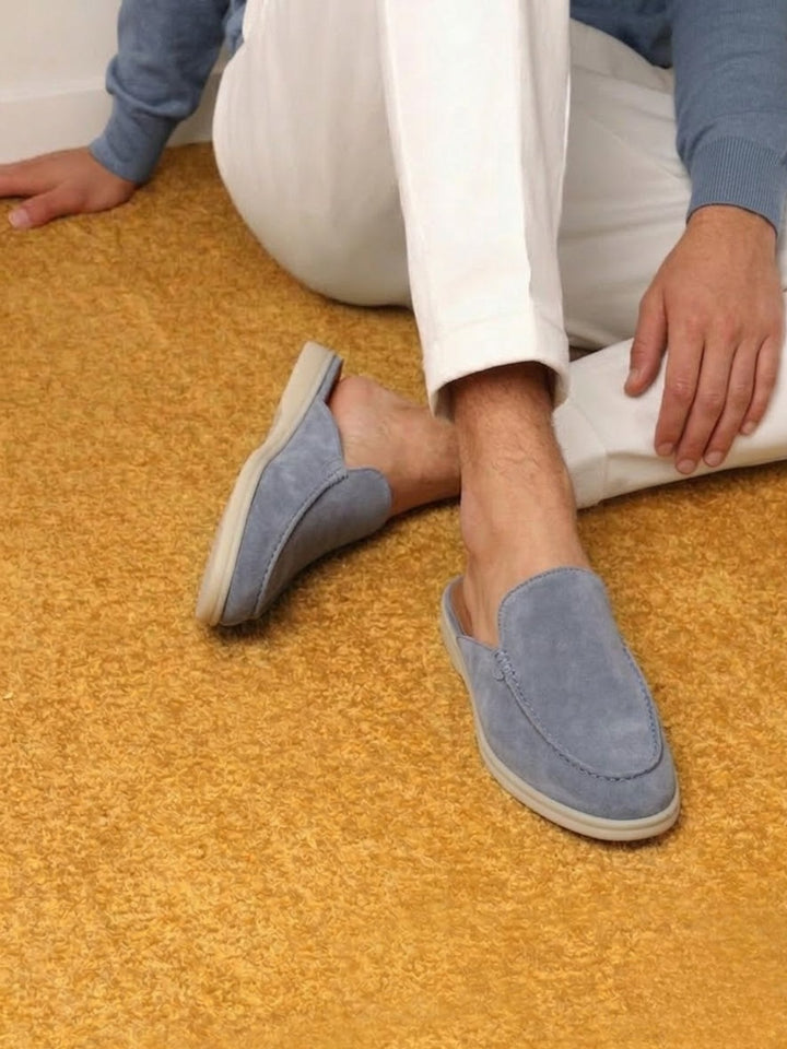 Men's easy wear open heel mules. Casual footwear with elegant stitched detail, perfect for smart casual looks.