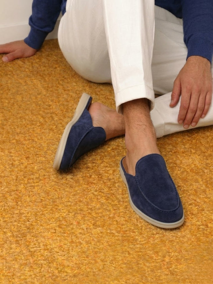 The durable sole of men's slip-on mules. Designed for comfortable wear with open heel & stitched detail.